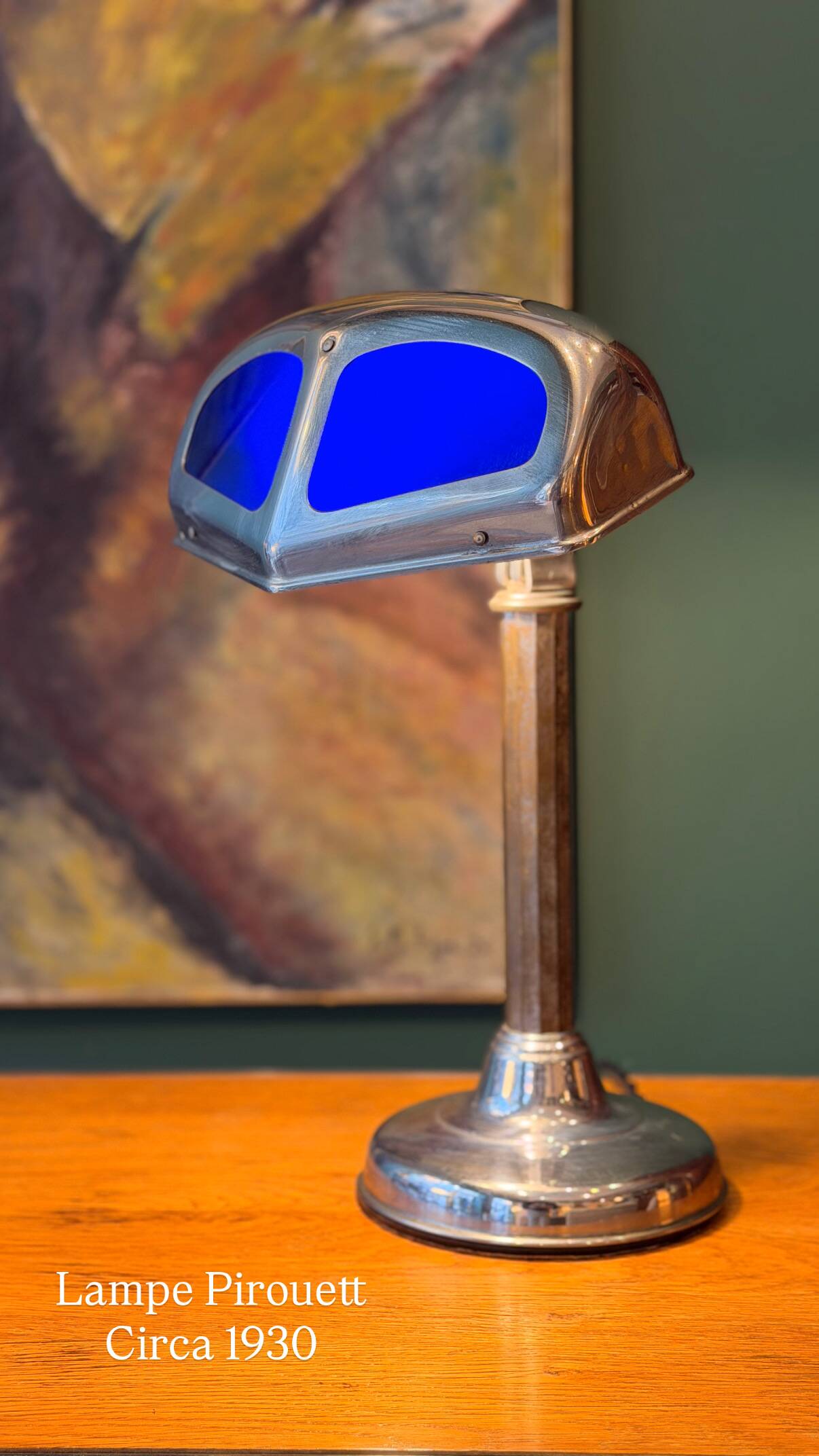 Adjustable Pirouette lamp from the 1930s in chrome metal.