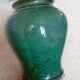 Vase en terre émaillée verte