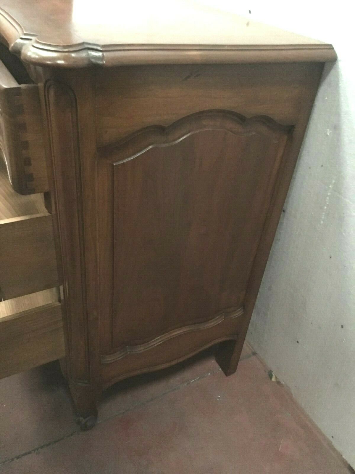 Three walnut drawers chest