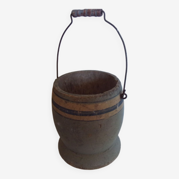 Old wooden beach bucket