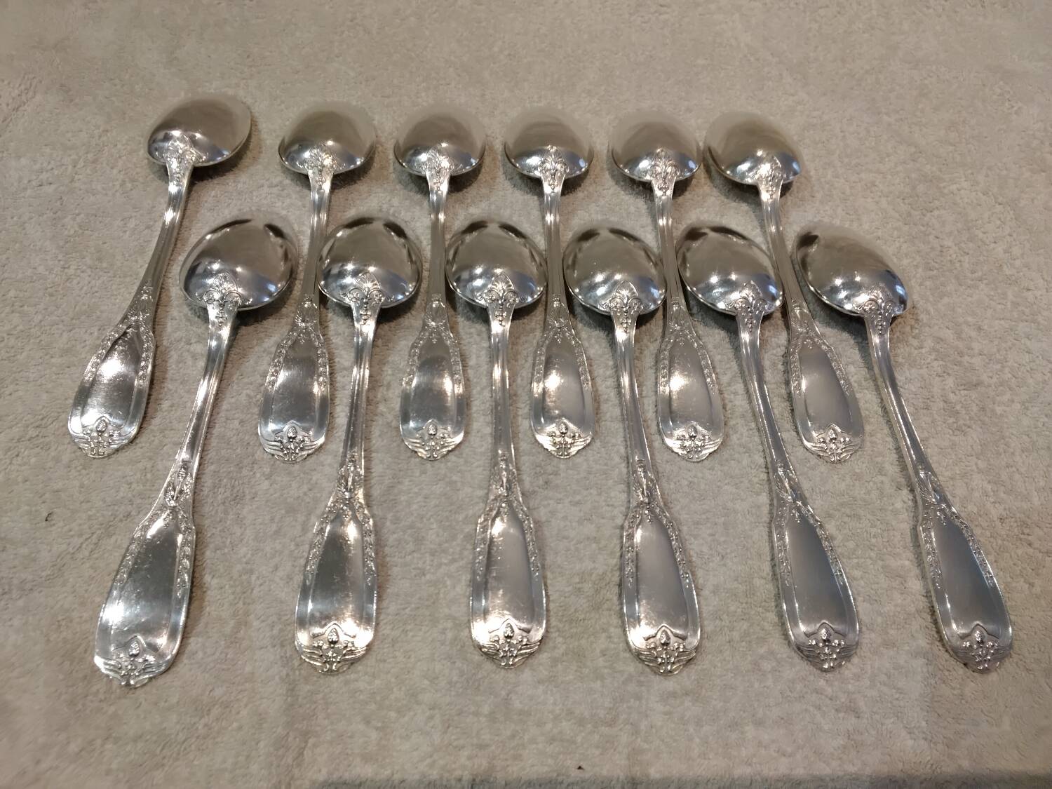 12 silver-plated metal soup spoons by Ravinet & Cie, Empire 81.