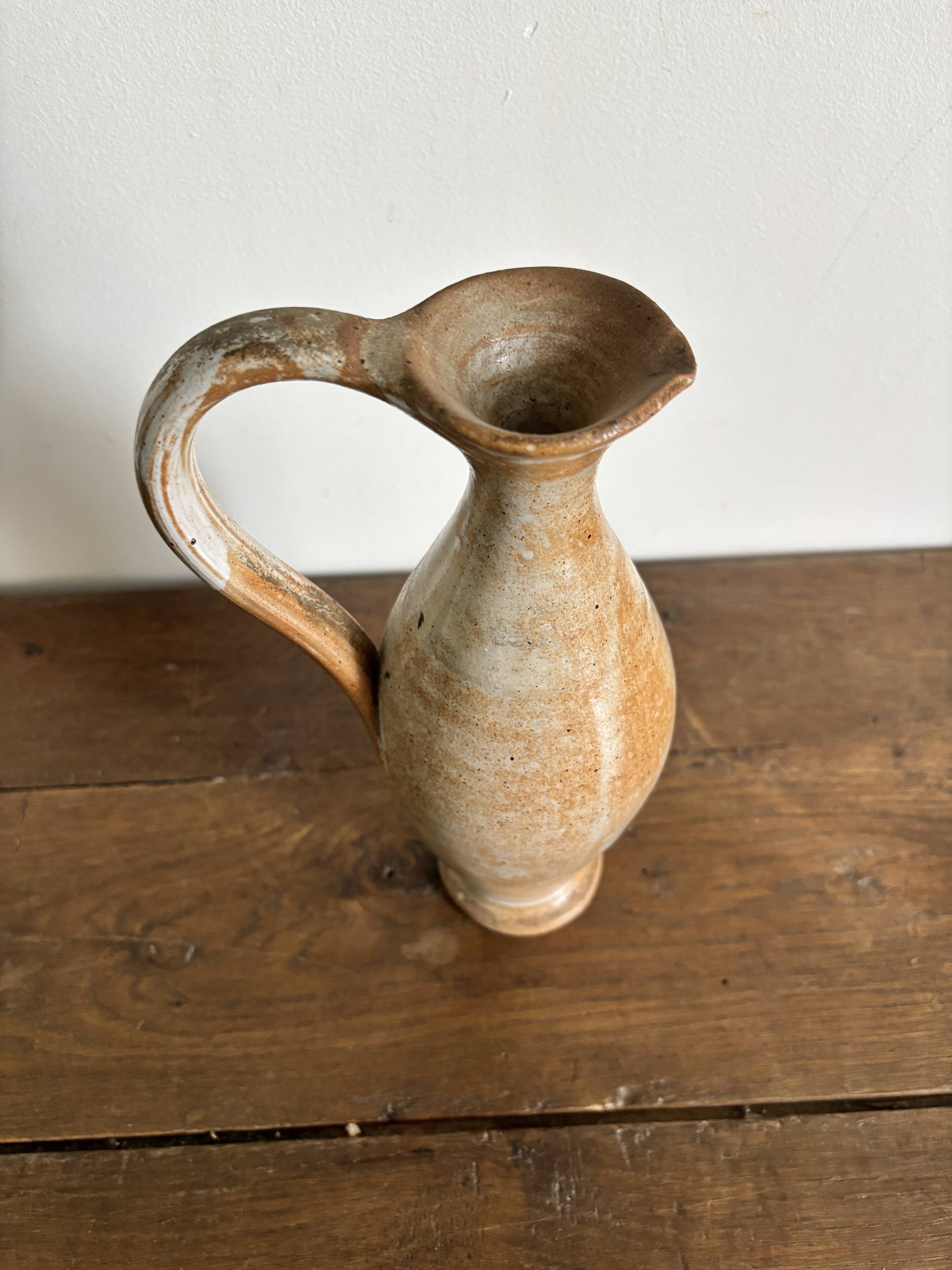 Handcrafted stoneware vase, a vintage piece from the 1960s.