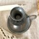 Tin thumb candle holder