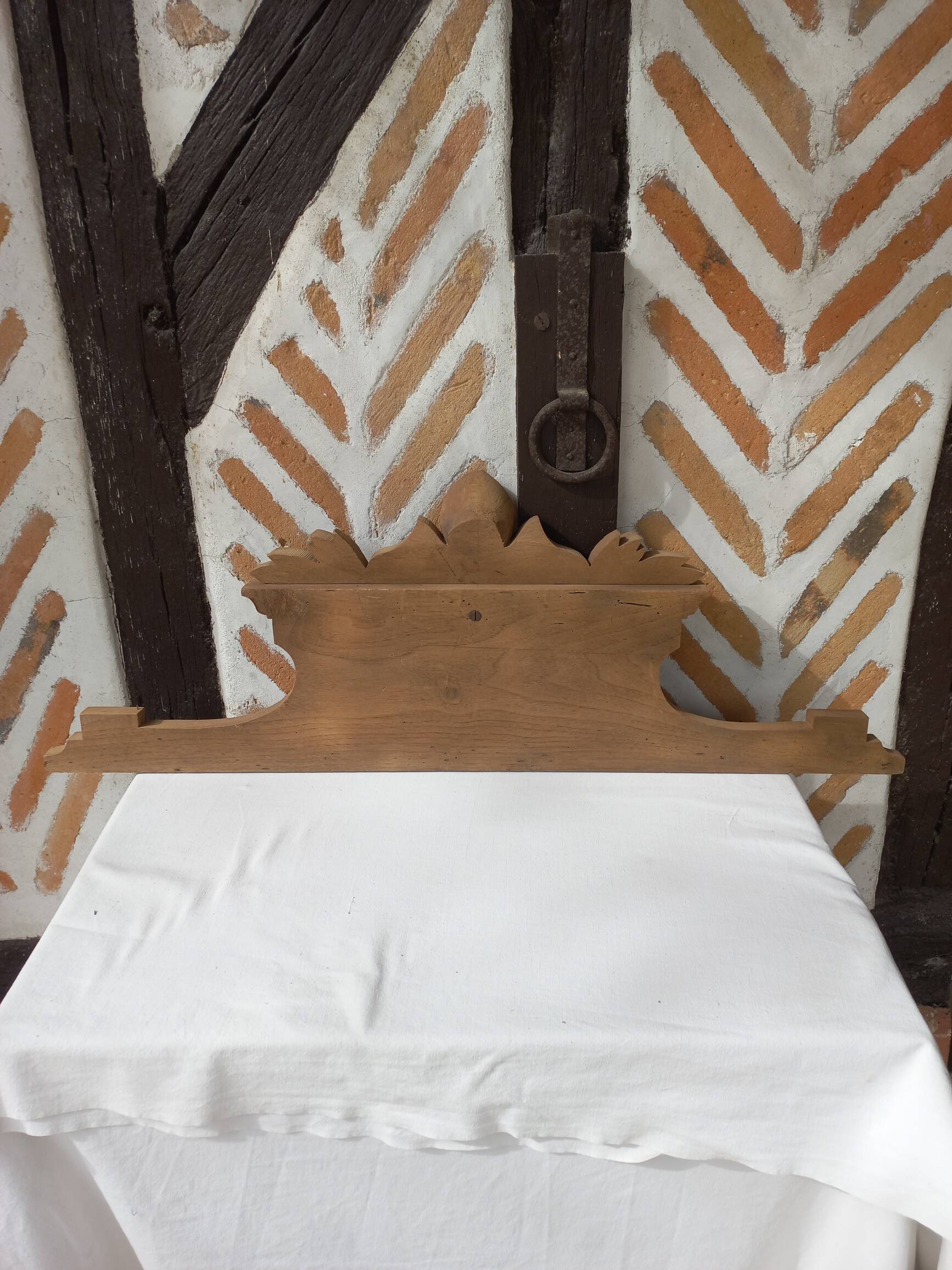 Old sandblasted wooden pediment