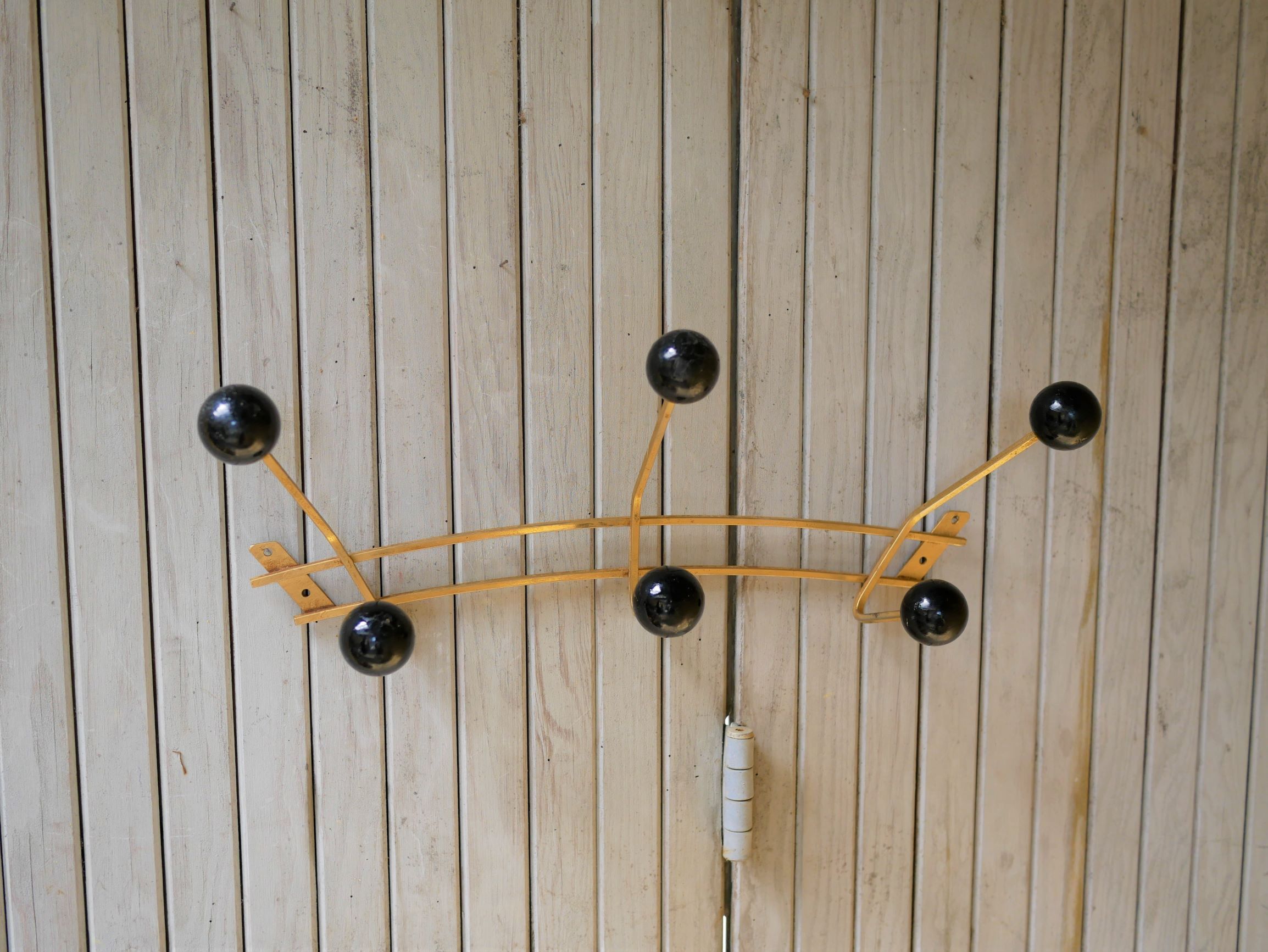 Porte-manteau mural vintage noir et doré