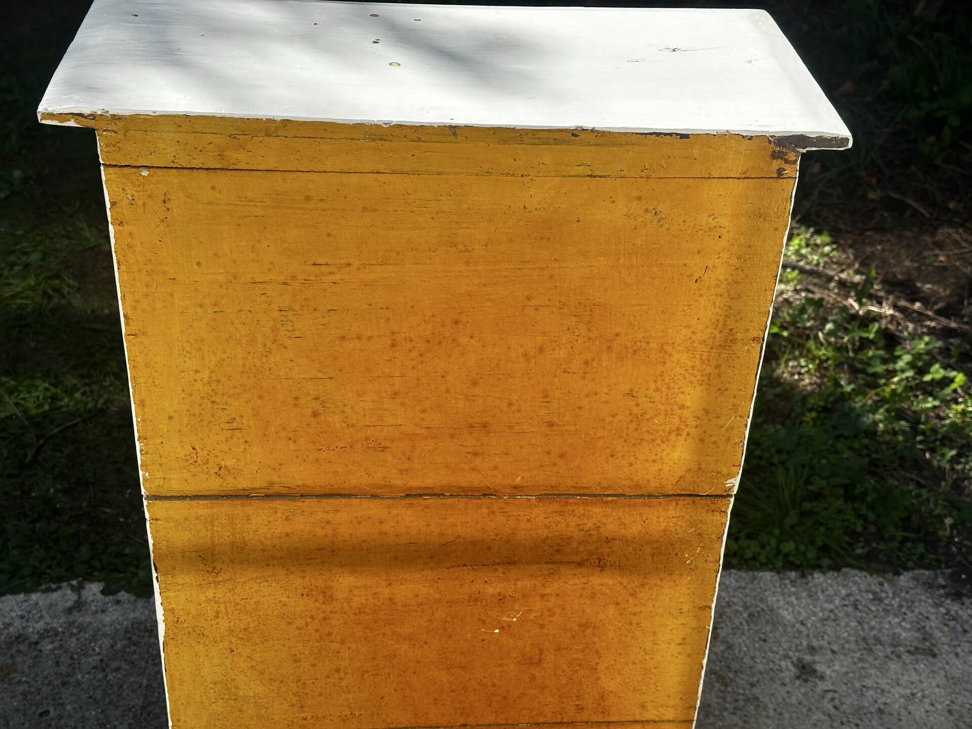 Small antique workshop cabinet with 8 painted wooden drawers.