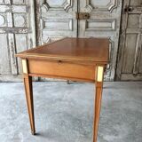 Directoire style flat desk circa 1960 in light cherry wood.