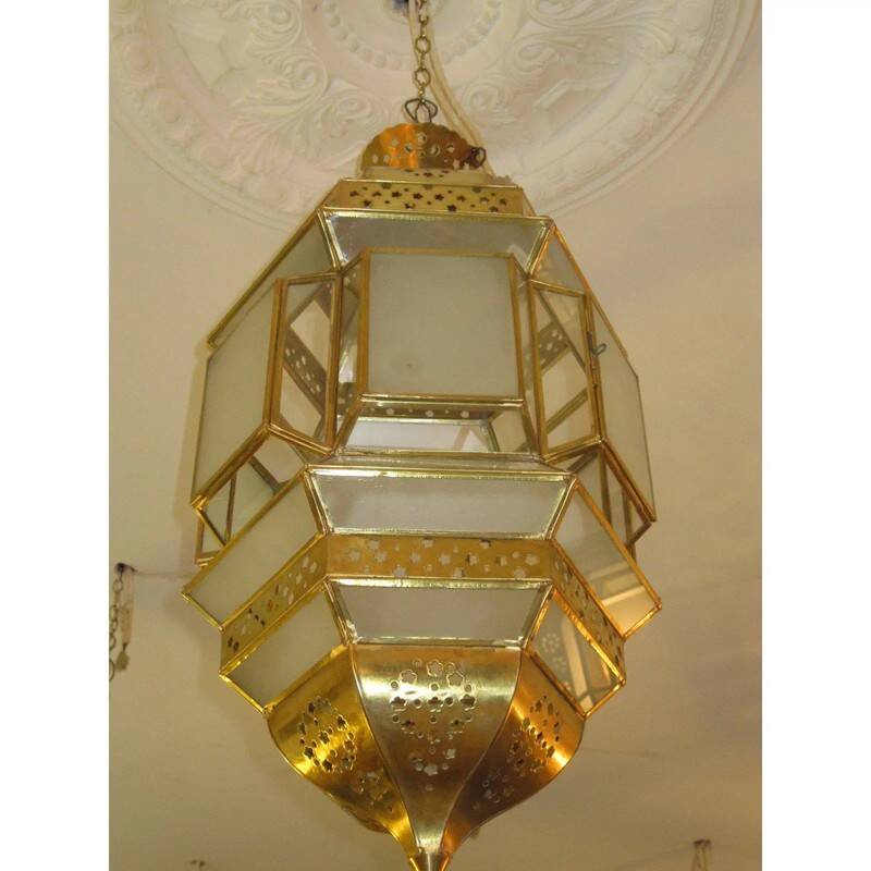 Traditional Moroccan hanging lantern in glass and metal.