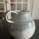 large blue ceramic pitcher