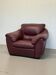 Fauteuil en cuir bordeaux Natuzzi