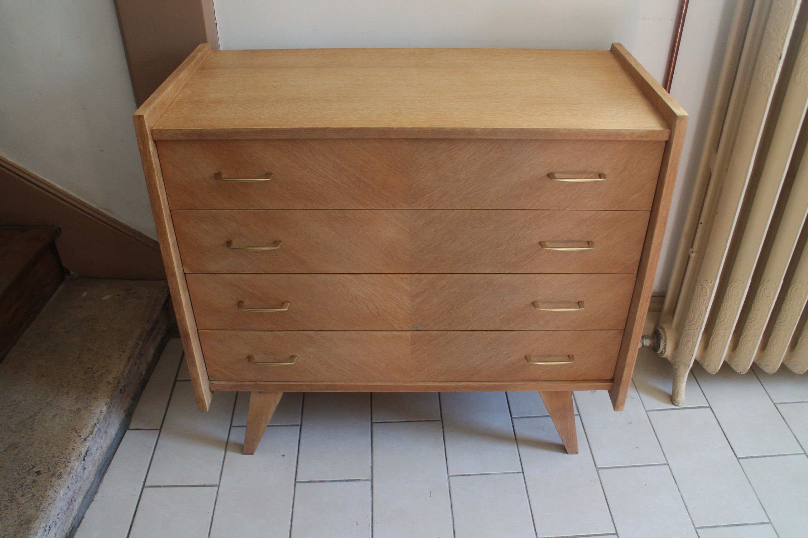 Chest of drawers with compass feet in raw wood