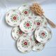 Assiettes plates vertes et bordeaux des années 50's