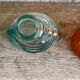 3 glass bottle fish