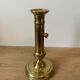 Brass pusher candle holder