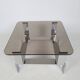 Table basse métal chromé et verre fumé 70