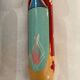 Pair of Kokeshi dolls