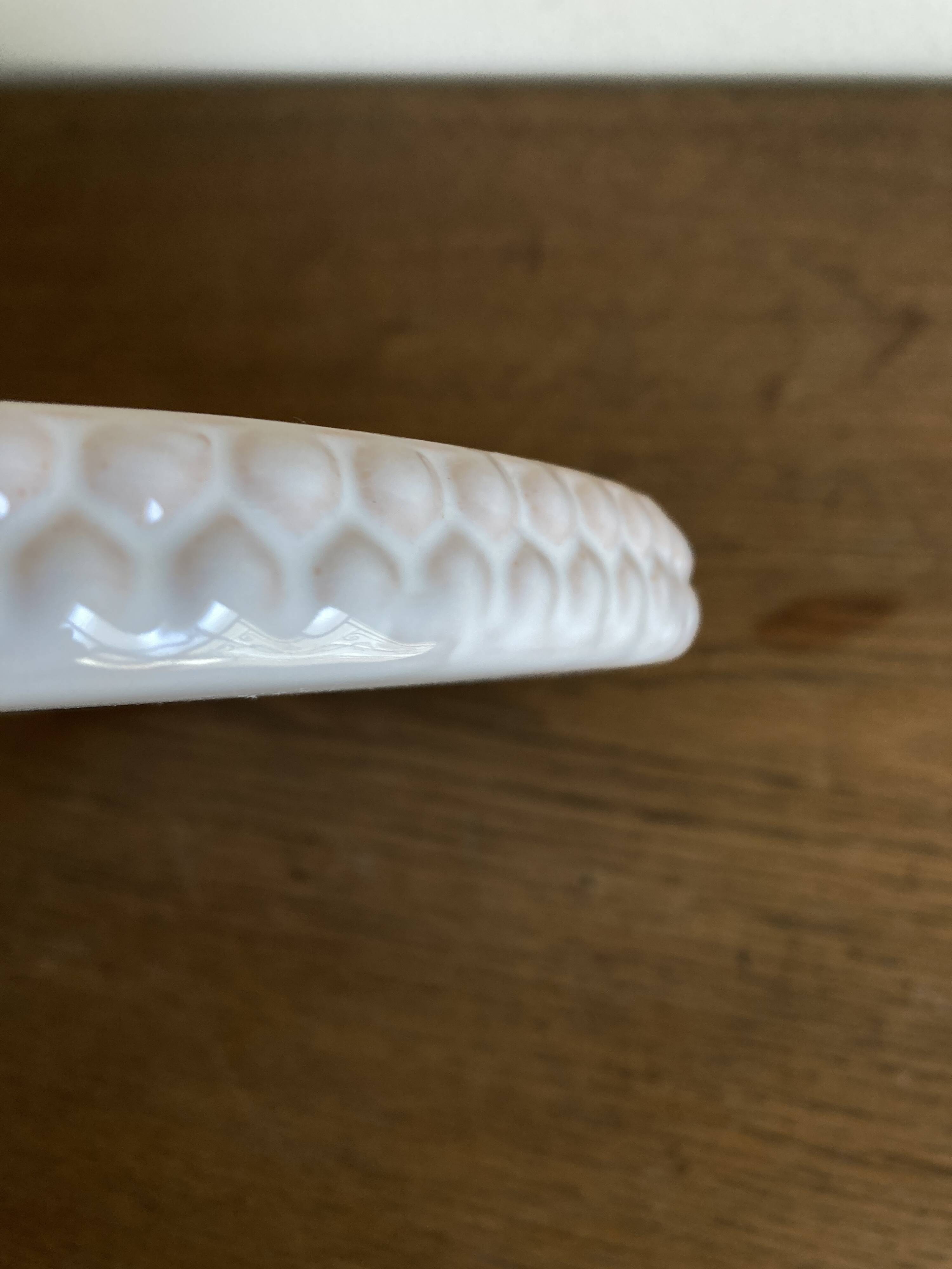 Pierre Motton glazed earthenware scalloped trivet for Gien