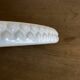 Pierre Motton glazed earthenware scalloped trivet for Gien