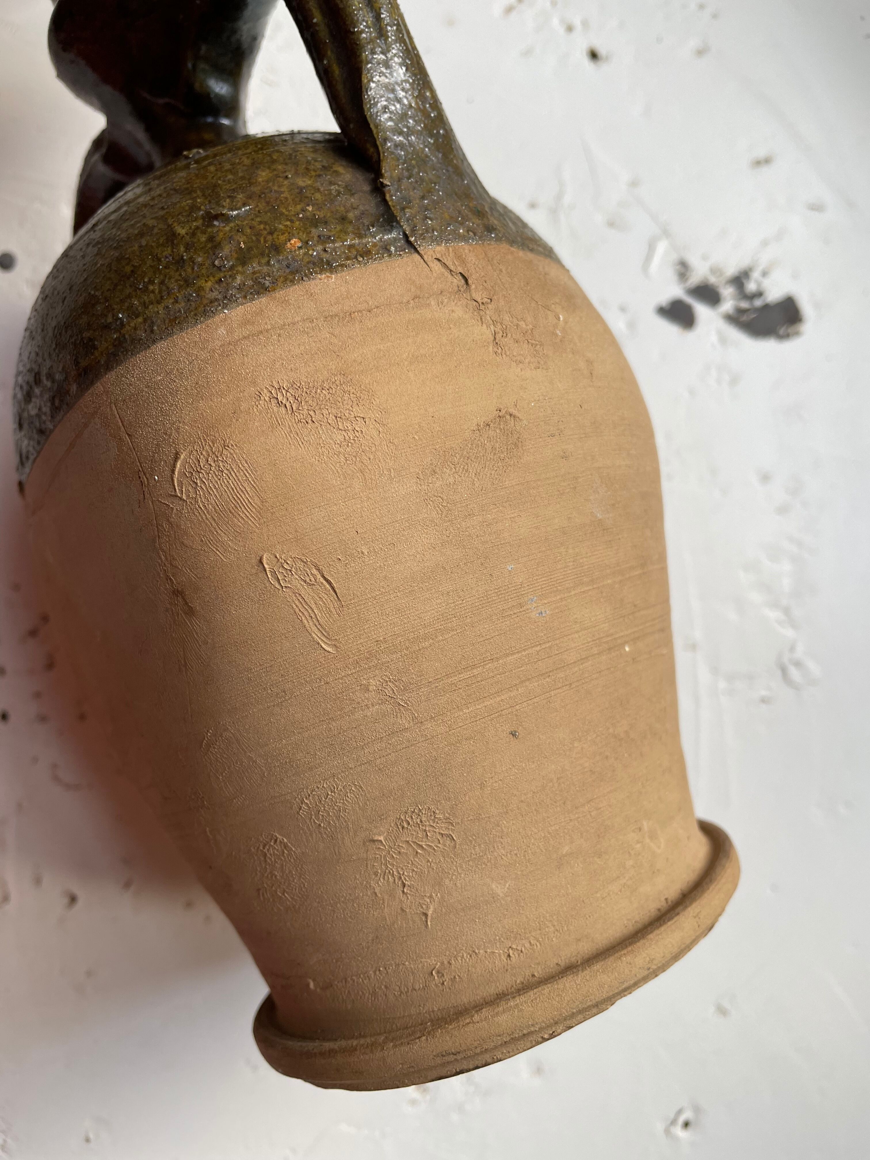 Persimmon glazed terracotta oil jar