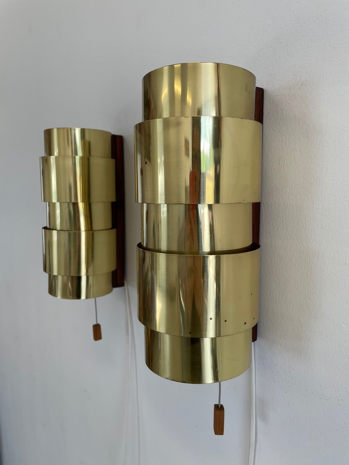 Pair of Scandinavian teak and brass sconces