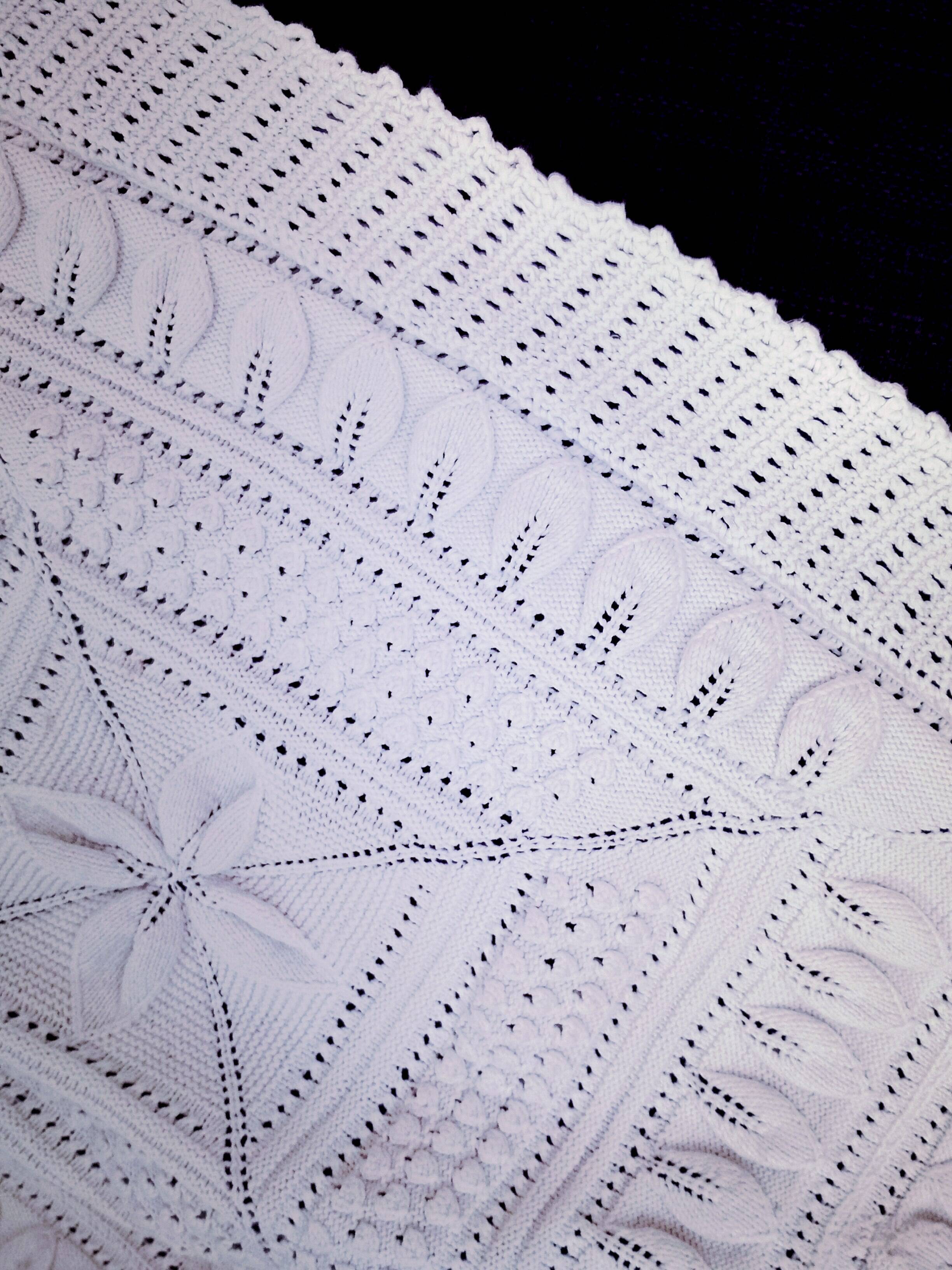 Knitted white cotton bedspread