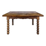 Dining table with turned oak legs.