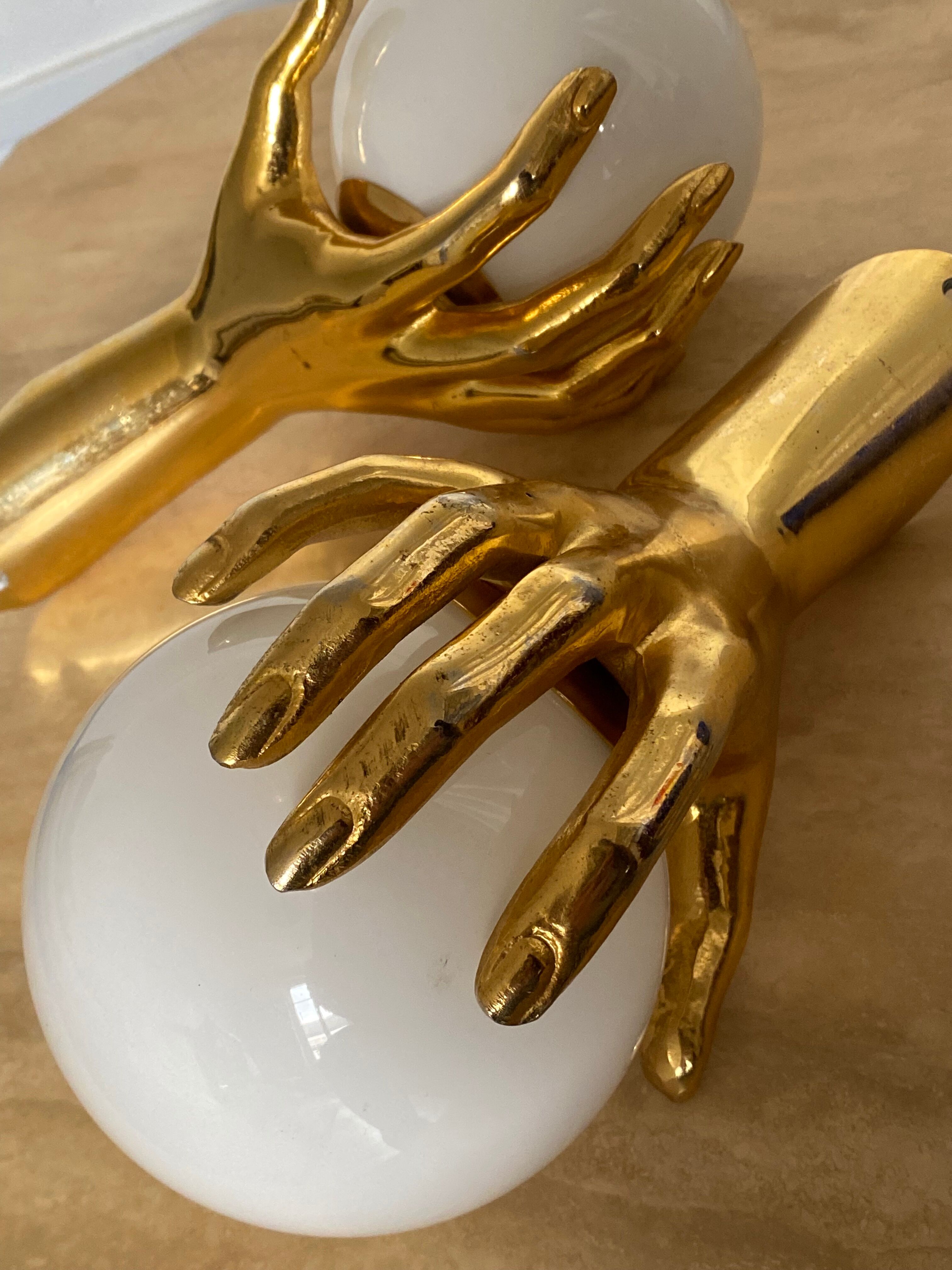 Pair of Arlus hand sconces