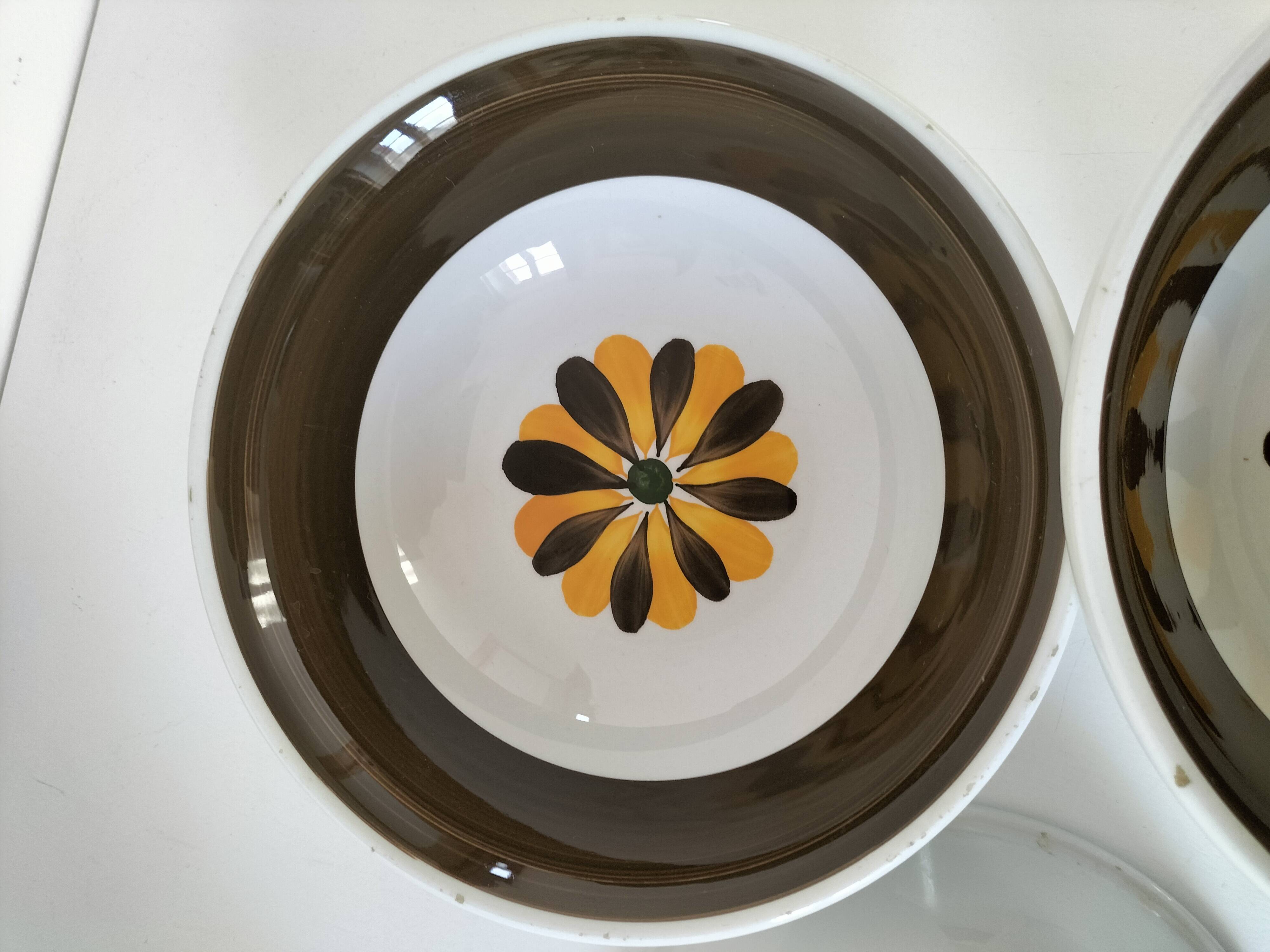 Trio of Italian 1970s deep plates, ochre brown floral decoration