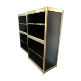 Shelves of black and gold windows