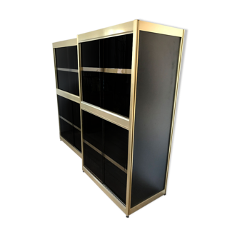 Shelves of black and gold windows