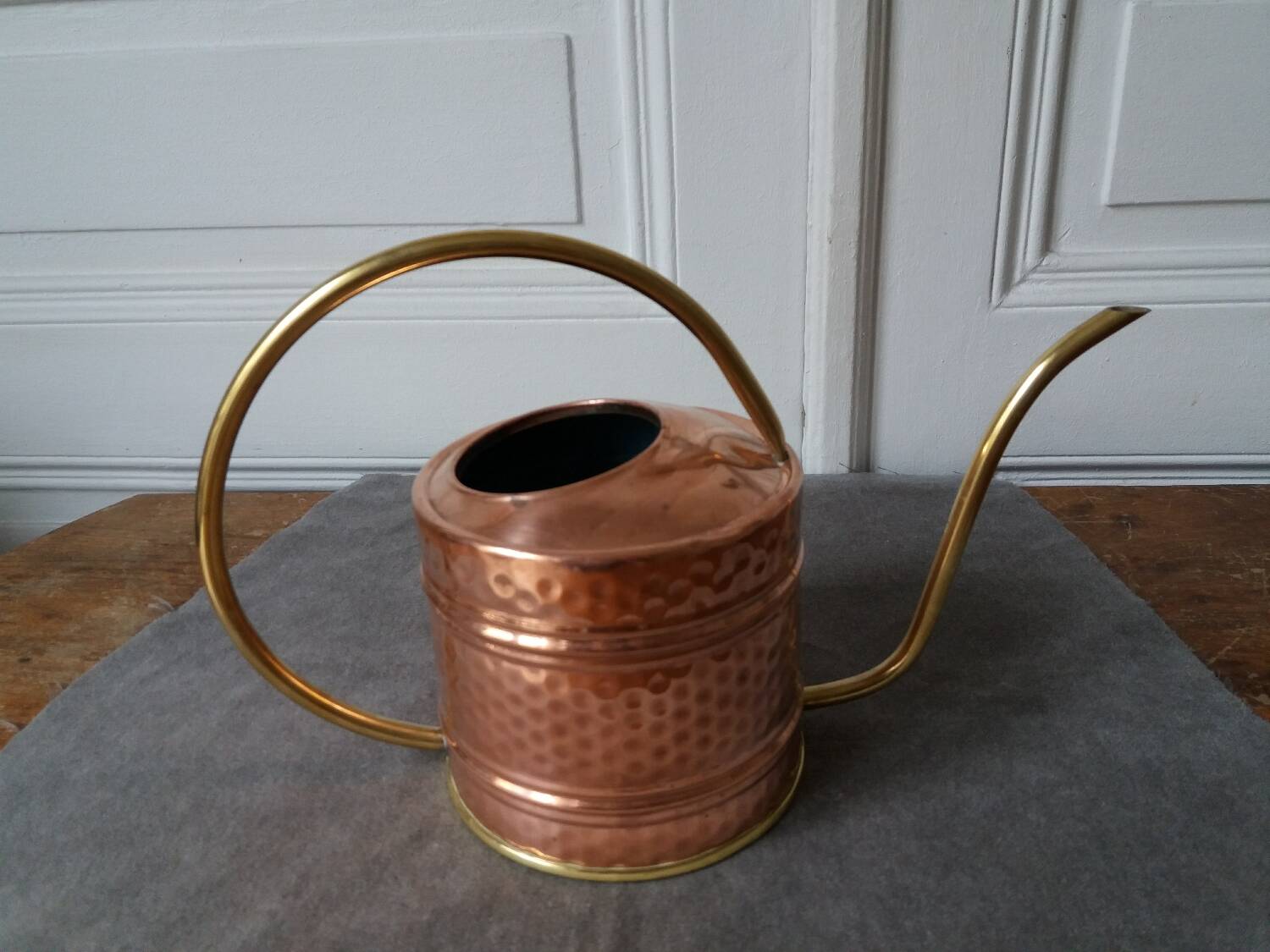 Old hammered copper watering can