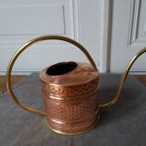 Old hammered copper watering can