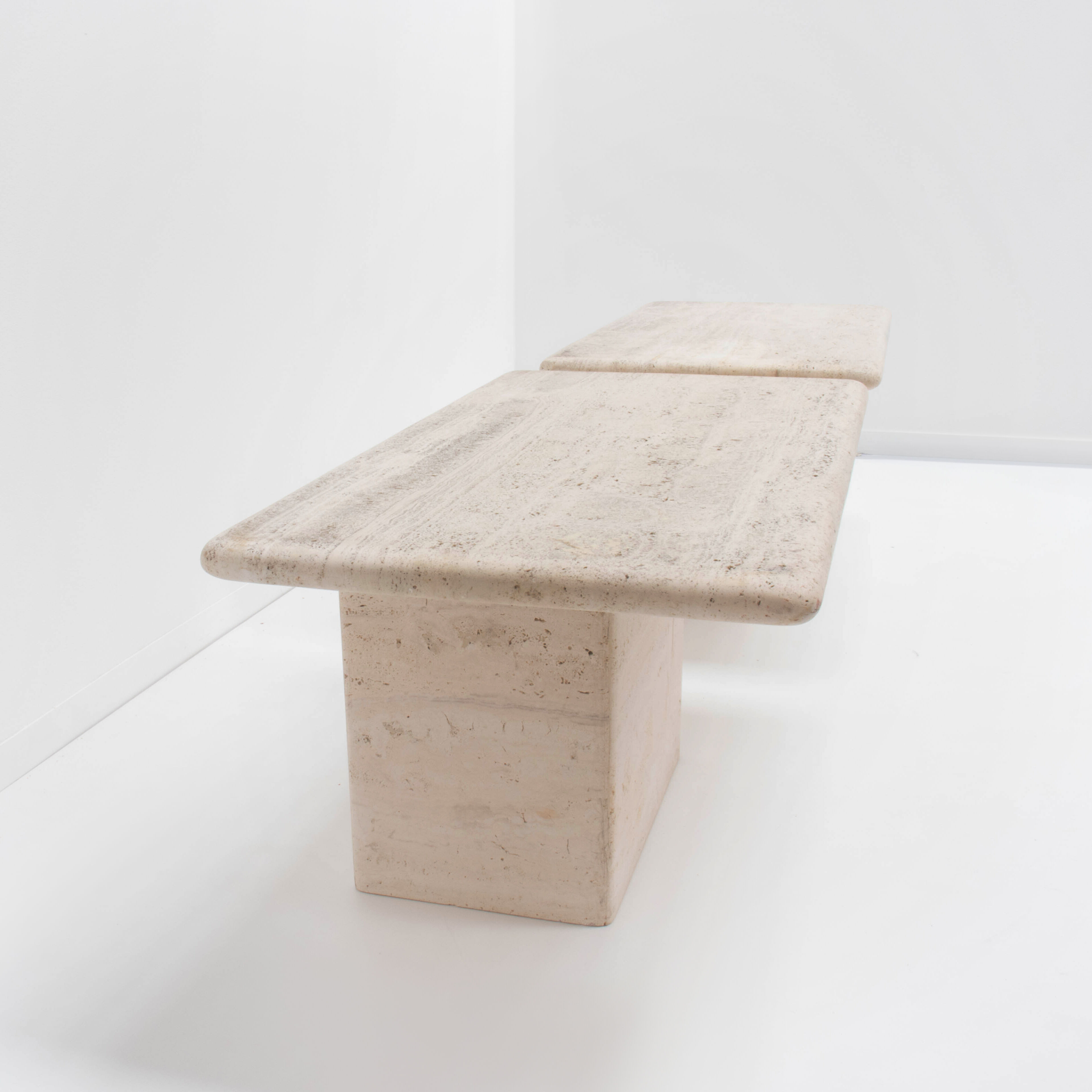 Travertine bedside tables