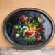 Black lacquered metal tray with multicoloured vintage Russian floral decoration.