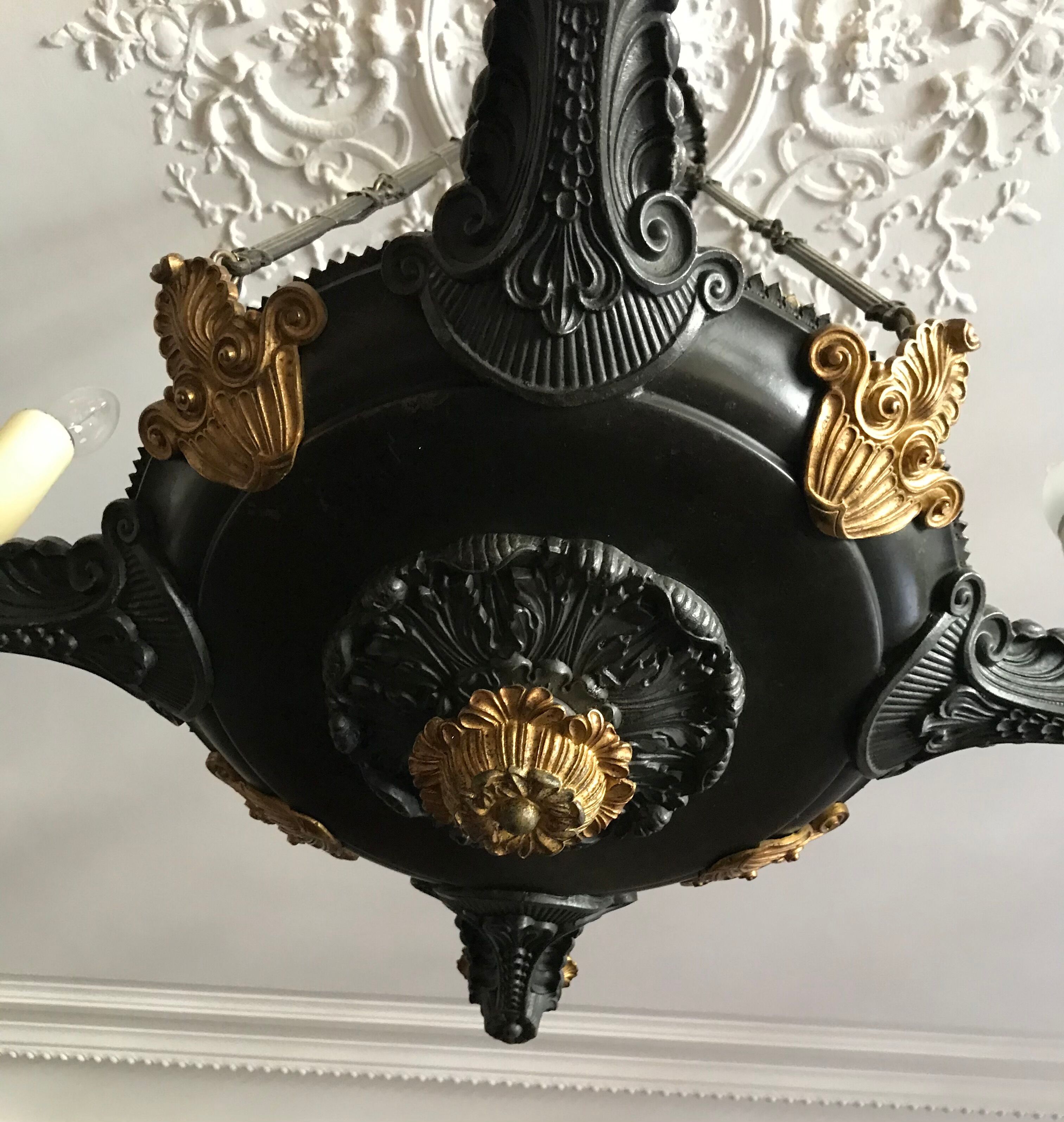 Bronze Empire-style chandelier with 4 lights