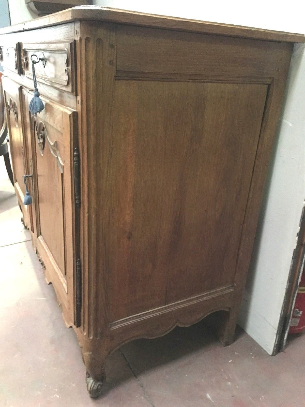Buffet Louis XV in moulded oak 18th century
