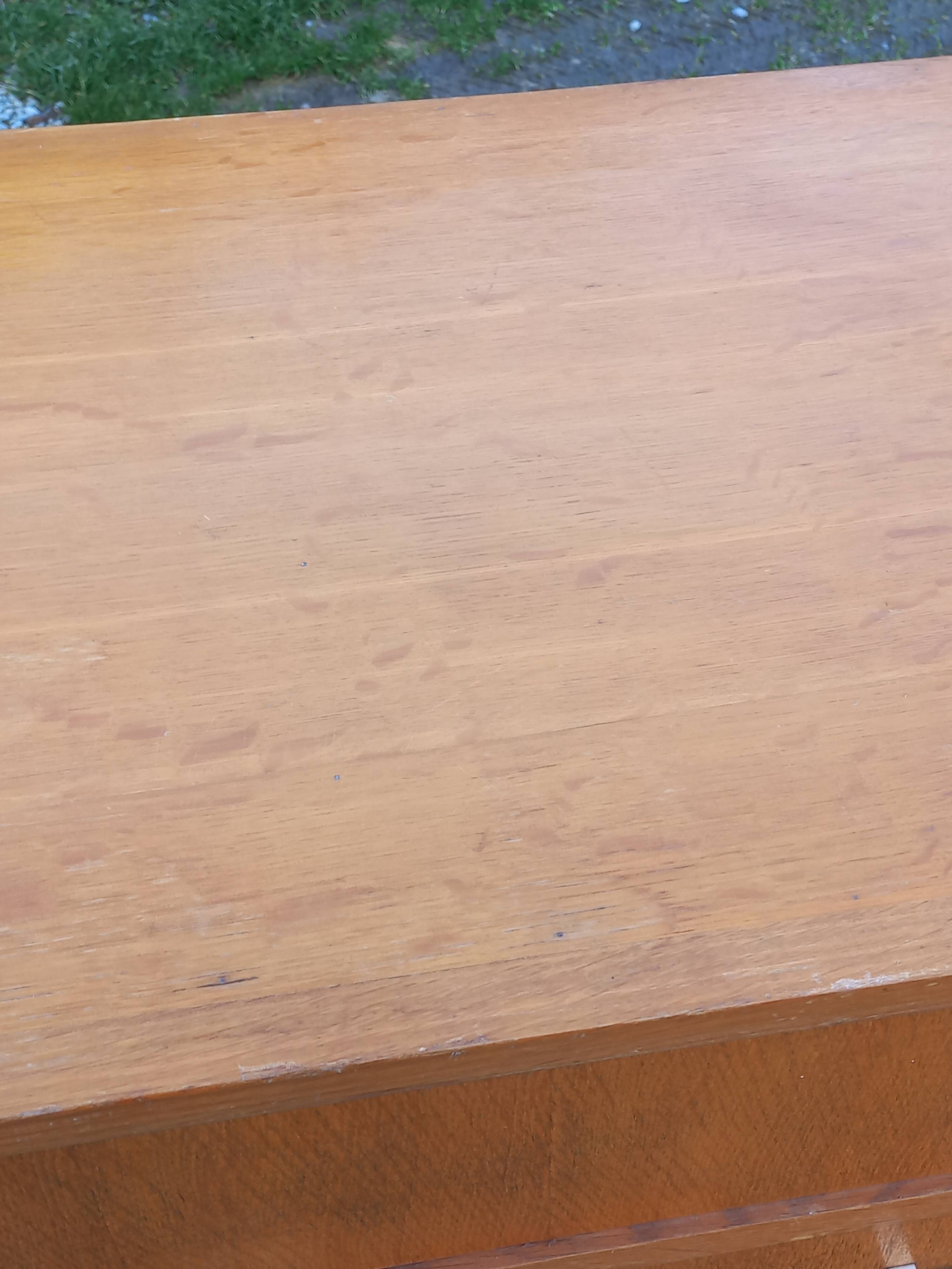 Vintage oak commode with tapered legs and wings from the 1950s.