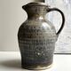 Large brutalist workshop carafe in glazed stoneware, signed, circa 1970.