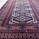 Handmade vintage 1960s Uzbek Bukhara rug – small wool tribal carpet (65cm x 95cm)