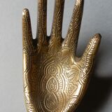 Empty-pocket brass hand