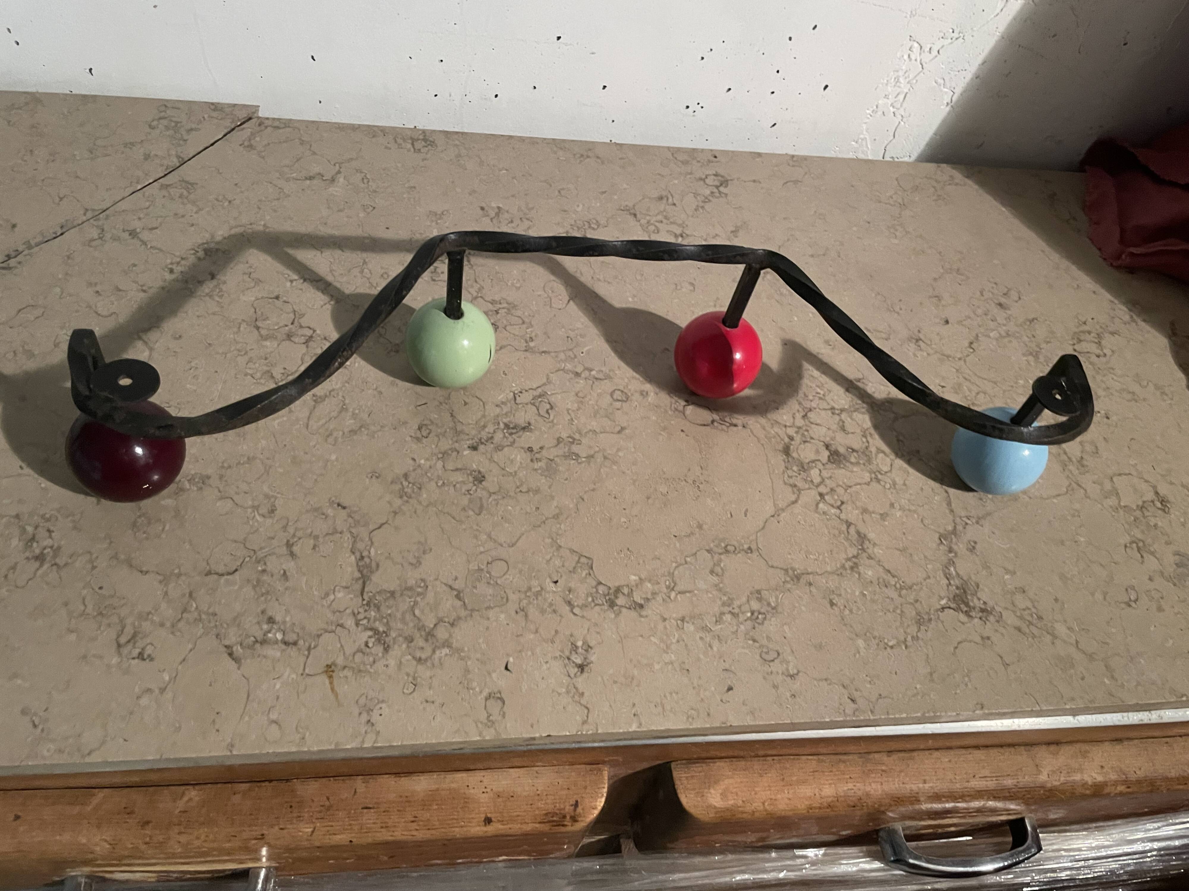 Coat hooks with 4 balls from the 1960s.
