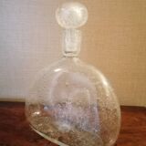 Clear bubble glass bottle molded for easy manual gripping