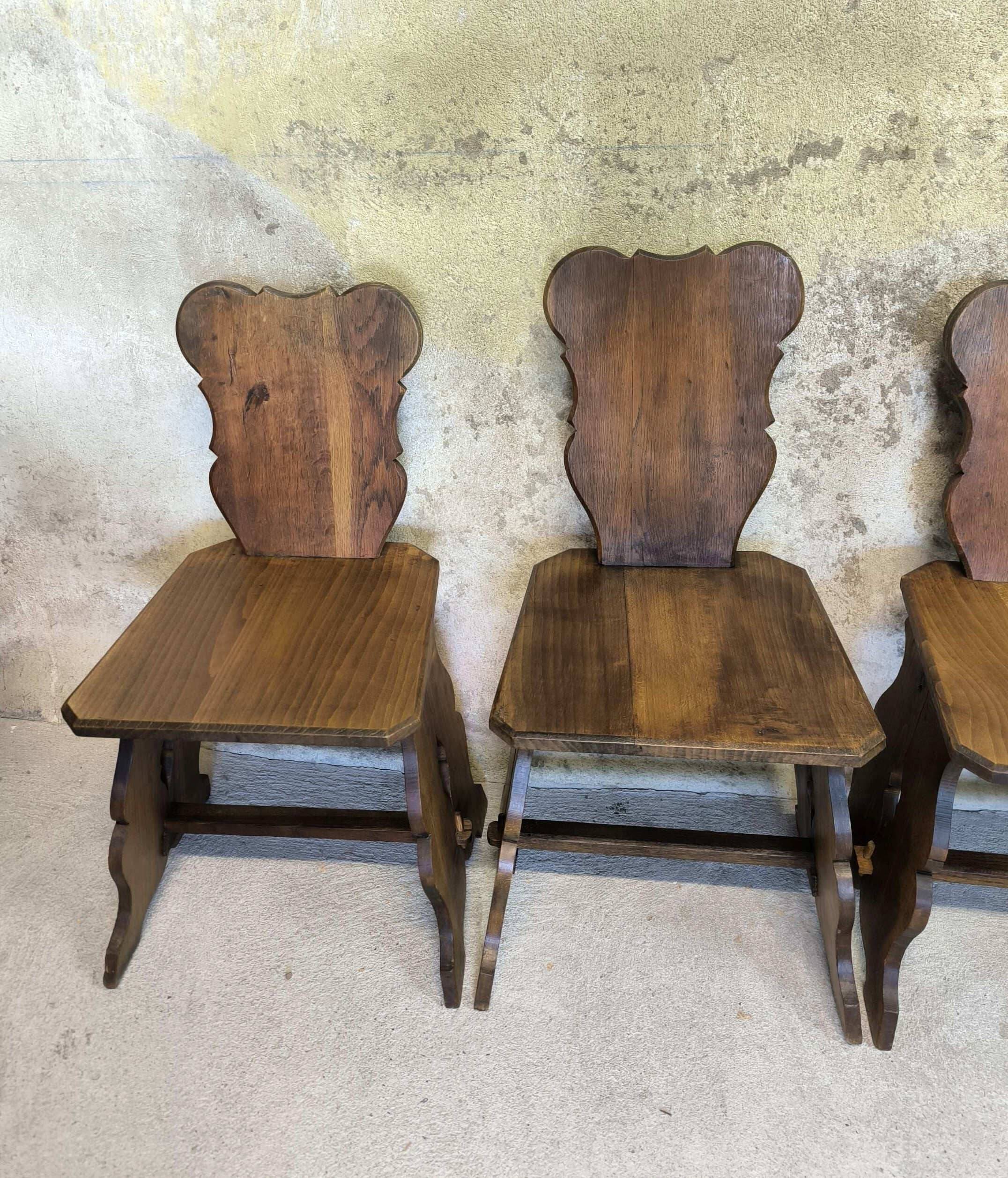 Set of six vintage brutalist wooden chairs.