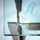 2 brutalist steel side tables with primitive  scene motifs etched glass