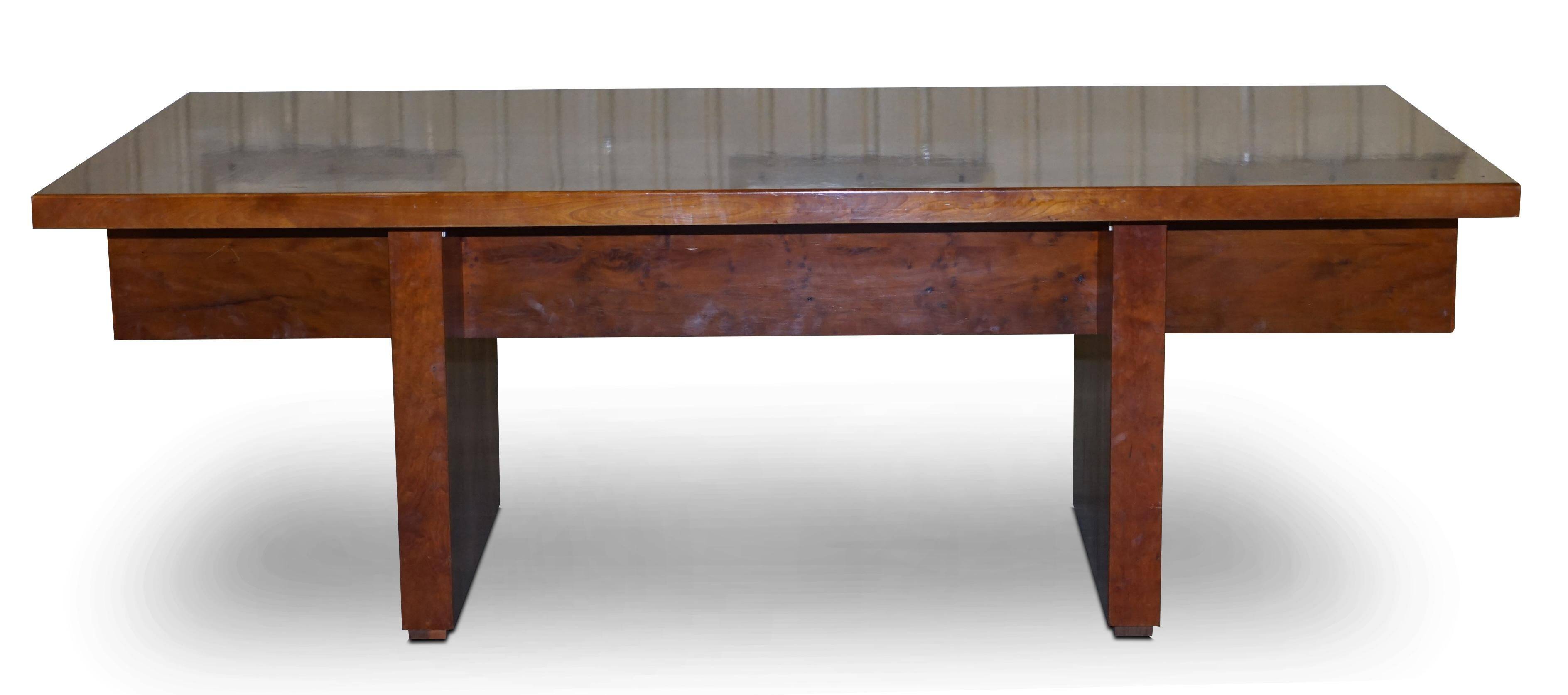 Very large contemporary desk made of yew burr wood.