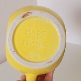 Old yellow pitcher Berger Annisette