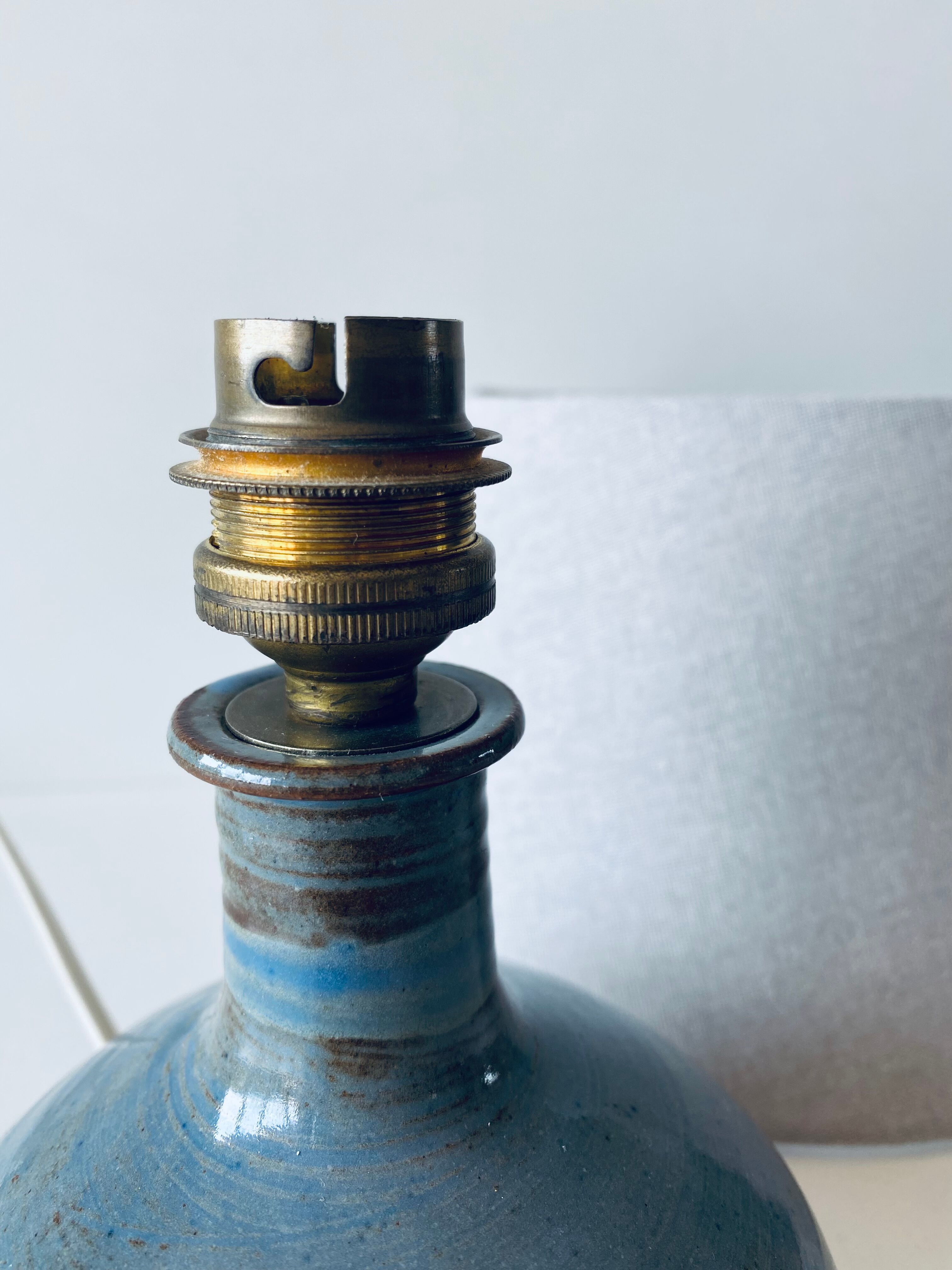 Lamp in enamelled sandstone