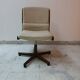 Vintage swivel wooden office chair from the 70s