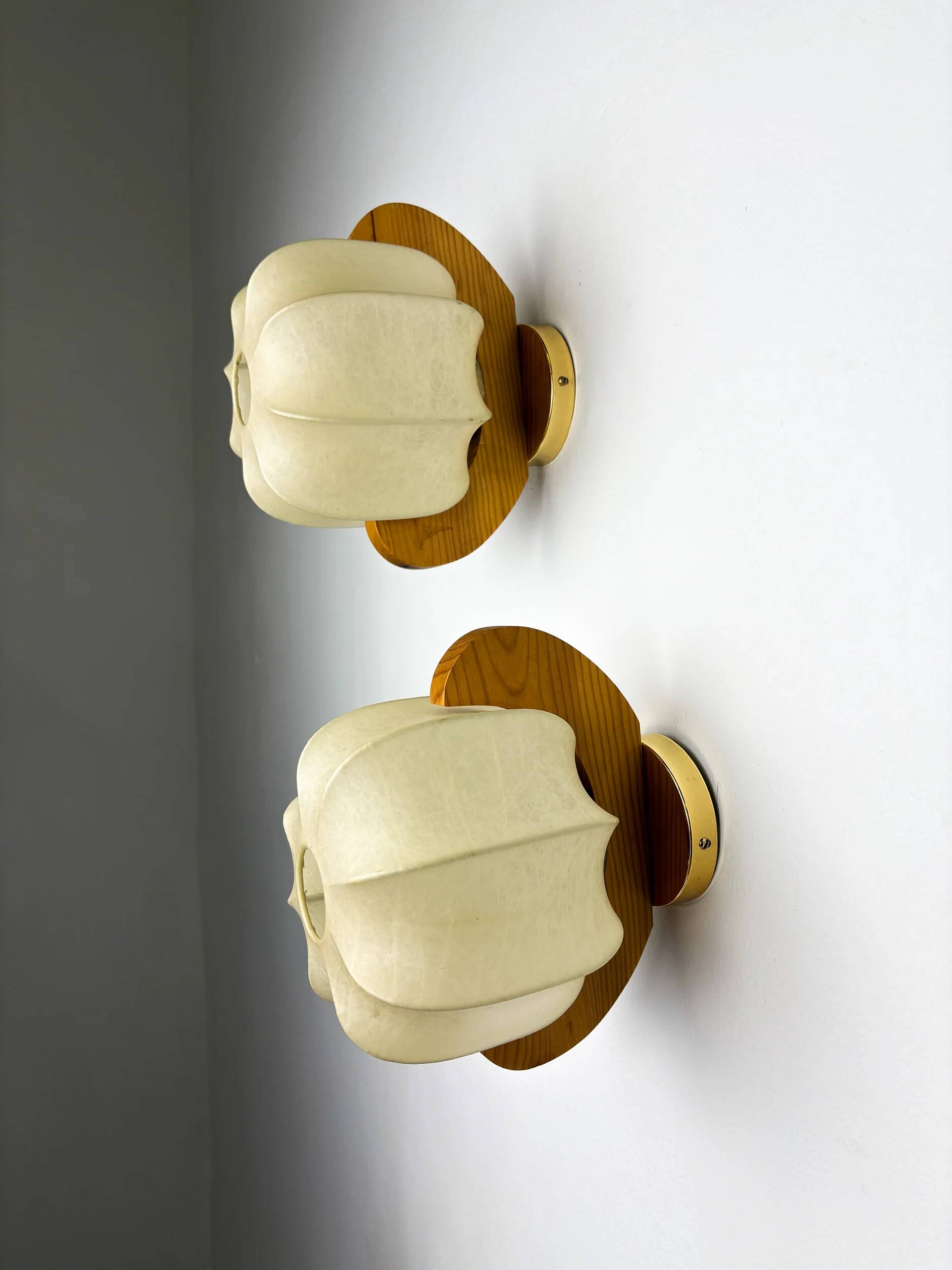 Pair of cocoon sconces with pine, Italy, 1970s