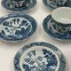 Set of 5 vintage porcelain cups and saucers with Blue Willow pattern.